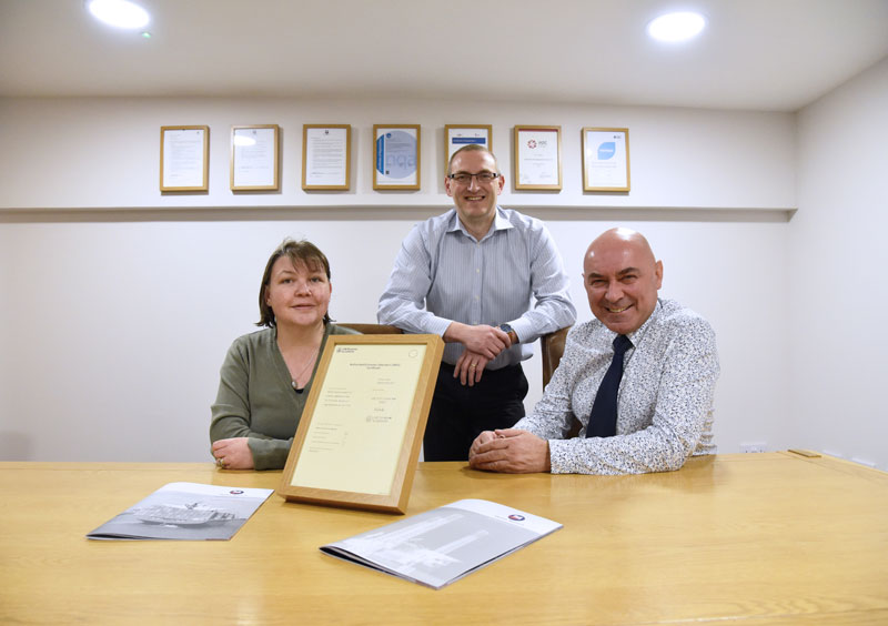 managing director and staff with certificate